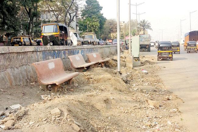 The benches have been replaced on an uneven surface in Malad