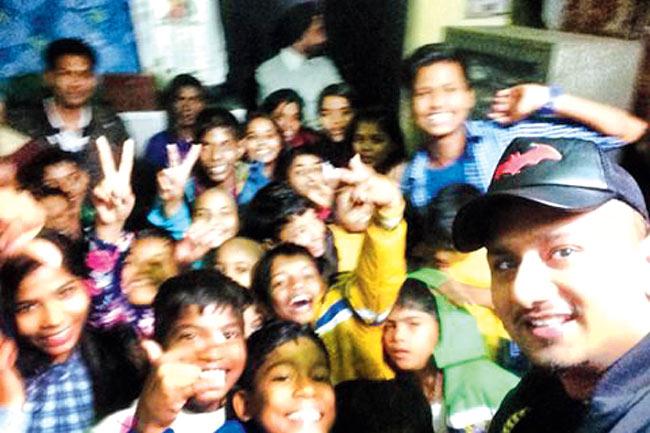 Honey Singh (right) at an orphanage 