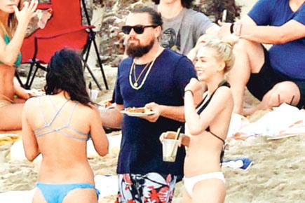 Leonardo DiCaprio takes mystery blonde bikini shopping
