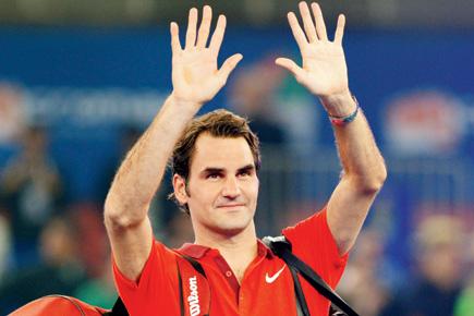 Federer beats Dimitrov for 999th win