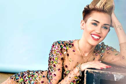 Miley Cyrus praises campaign featuring gay couple