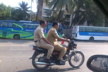 Mumbai: Bike-borne cops flout rules, ride without helmet at WEH