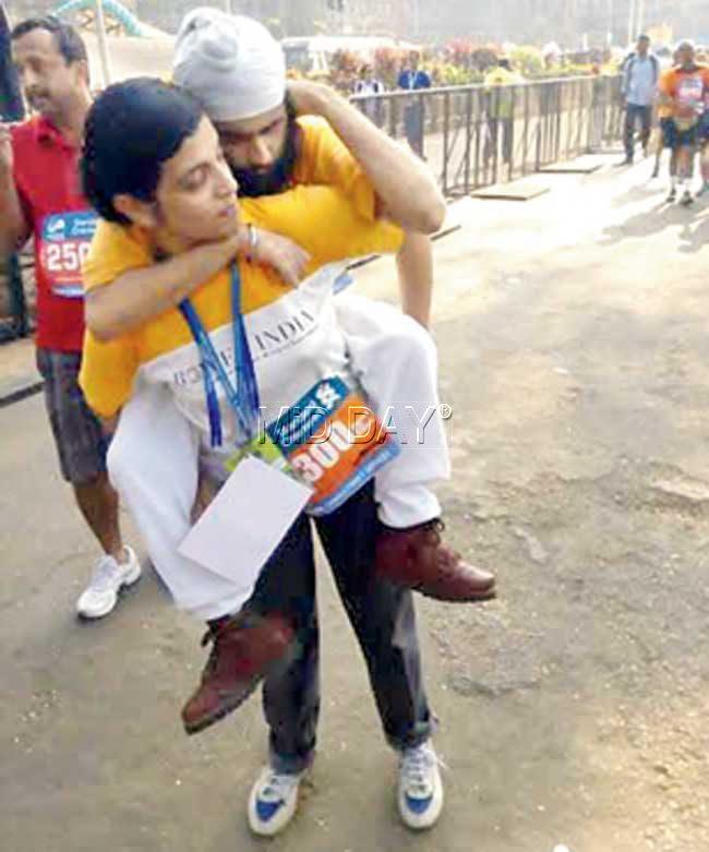 Angad Dugal is carried by his sister Satsimran. Pics/Rohan Koli