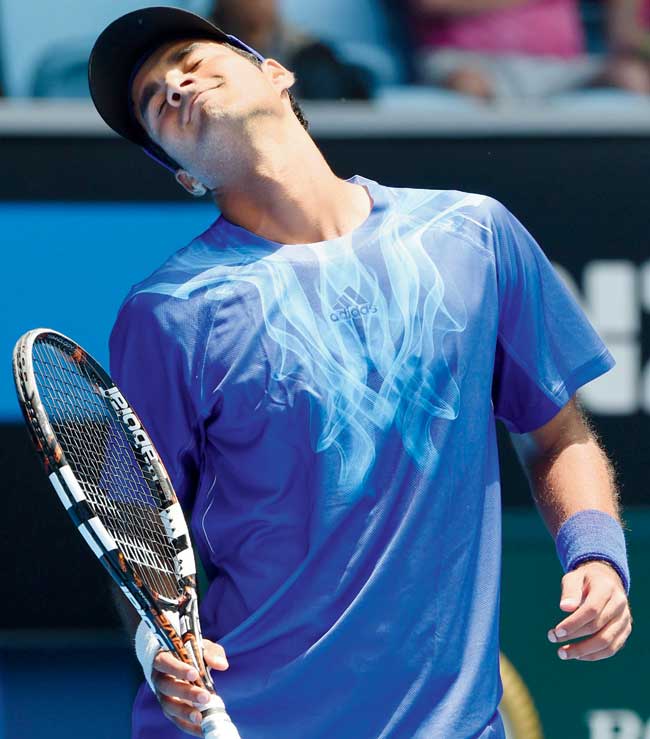 Yuki Bhambri reacts after a point against Andy Murray in Melbourne yesterday