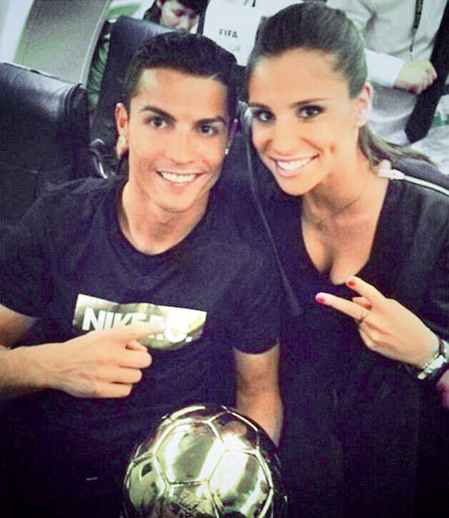 Love birds? A picture posted by RMTV reporter Lucia Villalon on her Twitter account shows her posing with Cristiano Ronaldo and the Ballon d