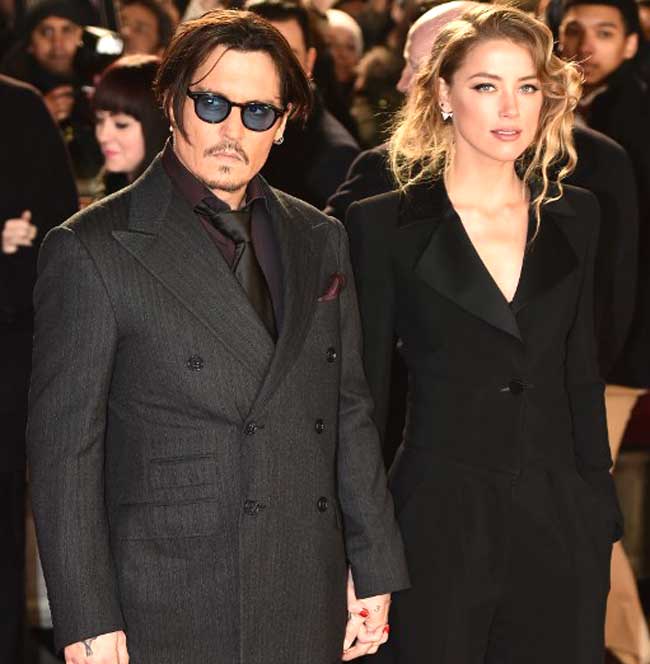 Johnny Depp and fiancee Amber Heard at London premiere of his movie 