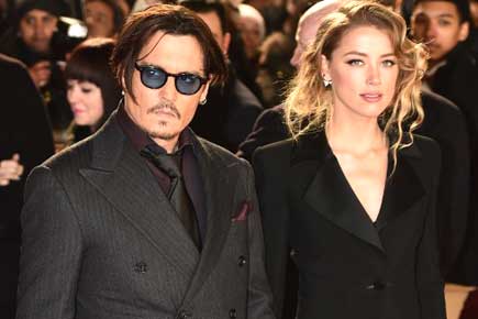 Johnny Depp, Amber Heard attend 'Mortdecai' London premiere