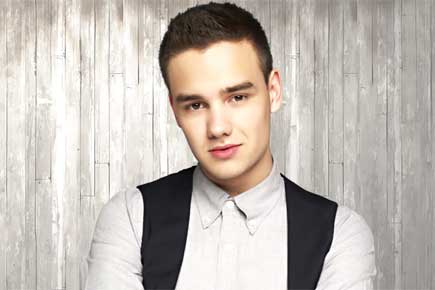 Liam Payne urges One Direction fans to change world