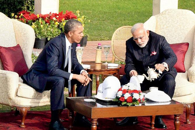 Tea-ing off: Modi pours tea for Obama during their talks at Hyderabad House in Delhi