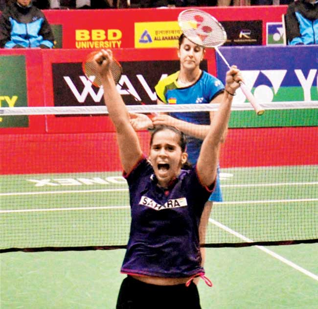 Saina Nehwal celebrates her win over Carolina Marin in Lucknow yesterday. Pic/PTI