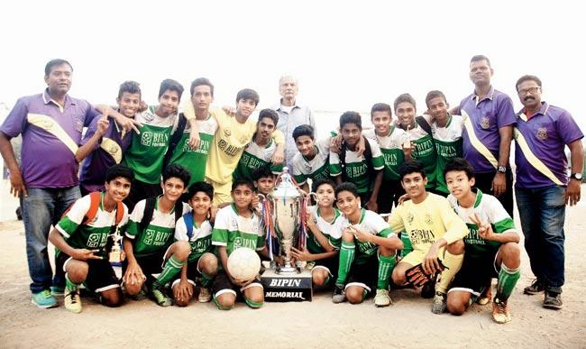 The victorious Vasai centre boys pose with the trophy after clinching the MSSA-Bipin Football Academy inter-centre tournament