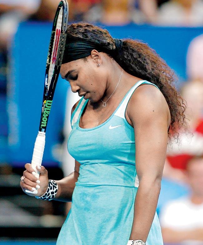 Serena Williams reacts after her loss yesterday