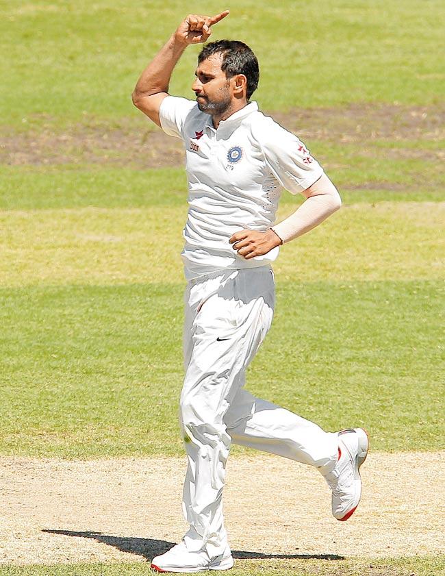 Mohammad Shami celebrates the wicket of Shaun Marsh in Sydney yesterday. Pic/Getty Images