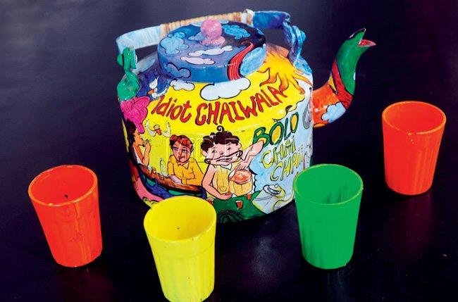 Mr Idiot; A vibrant, handpainted kettle priced at '2,500