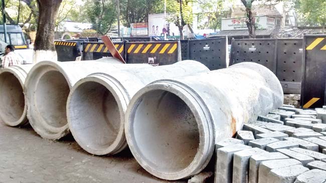 The road has been turned inside out for laying down storm water drain pipelines, necessitating blocking movement of traffic toward CST