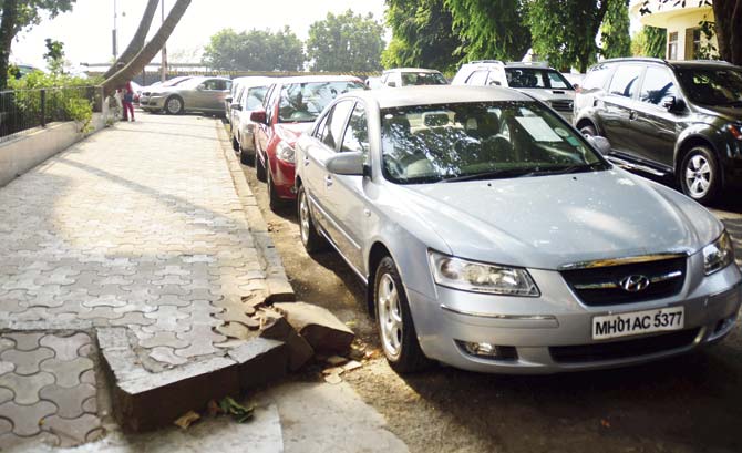 Cars parked on the road on Marine Drive