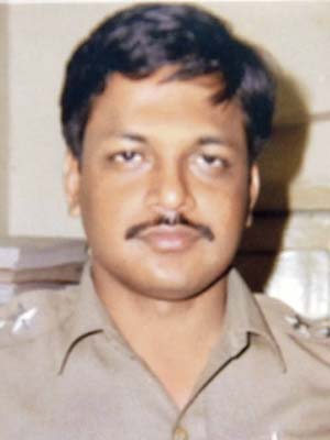 The senior officer, Deepak Phatangare, has a controversial past. File pics