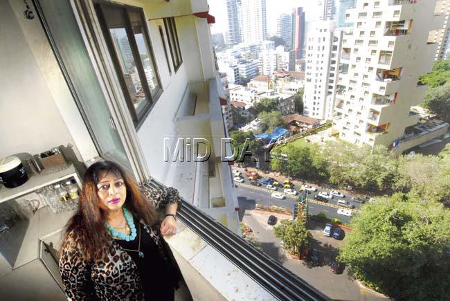 Devika Patel looking out of the window at her Peddar Road home. Pic/Sameer Markande