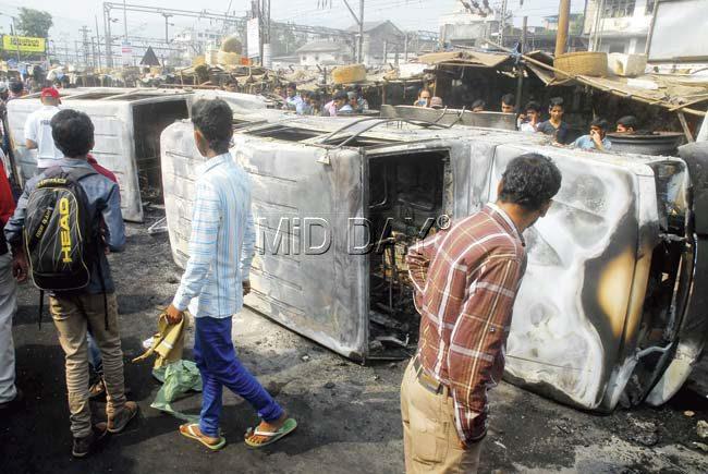 The furious crowd at Diva unleashed its anger by pelting stones and breaking the windshields of local trains. They also torched three vehicles outside the station a motorcycle and two police vans