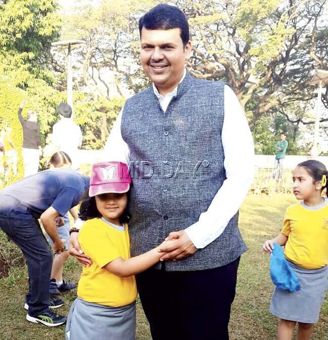 The CM with his daughter Divija at the Cathedral and John Connon school yesterday. He described the day as one of the finest in his life