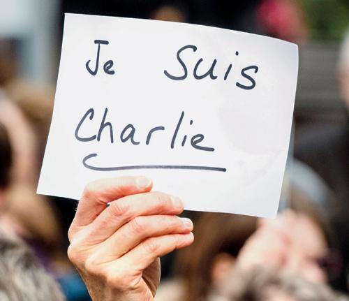 A sign in French reads ‘Je Suis Charlie’ or ‘I am Charlie’, at a rally in Lille, France. Pic/afp 