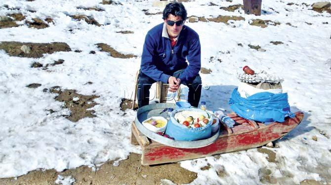 Mudasir Ahlone with his bhelpuri stall in upper Gulmarg, some 10,000 ft above sea level. Pic/Ashwin Ferro
