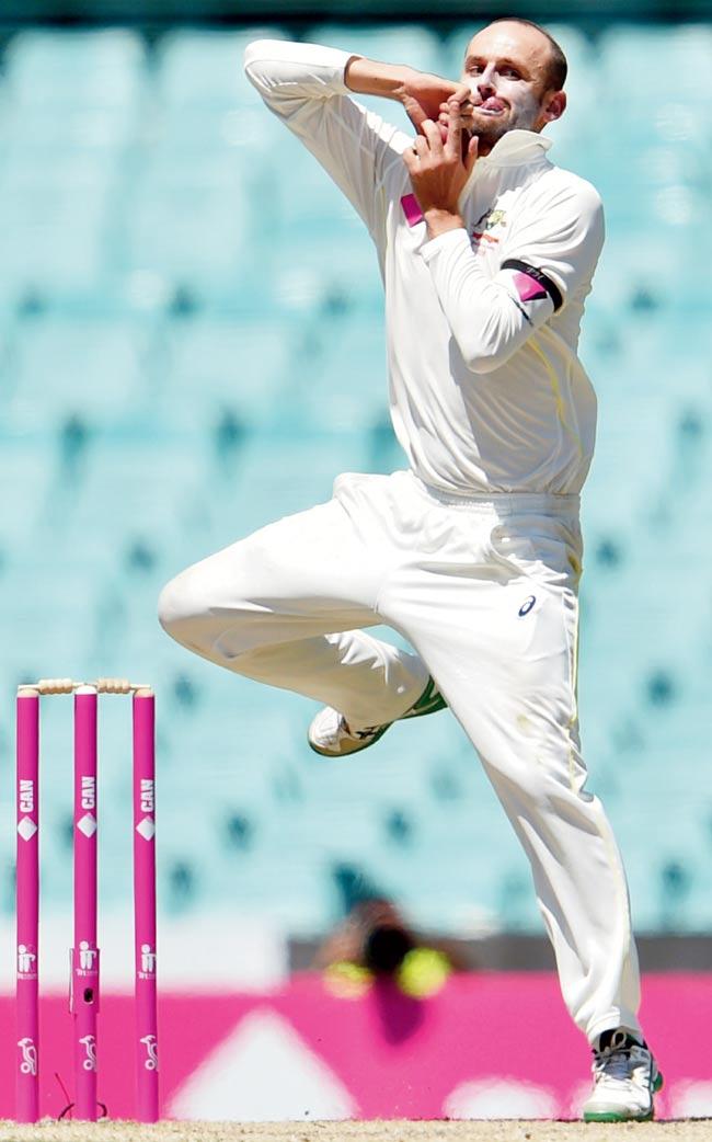 Off-spinner Nathan Lyon bowls on Day Four of the Sydney Test yesterday. Pic/AFP.
