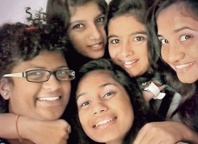 Naomi Fernandes (l) and her girl group always click selfies when they meet up