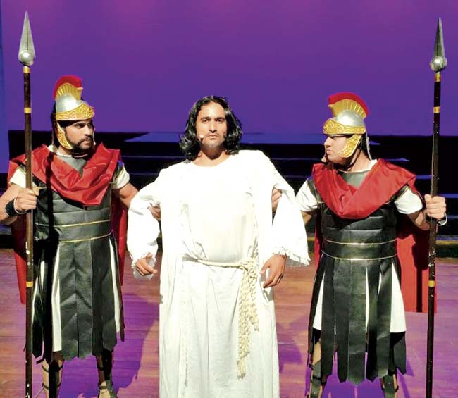 X Cast- Nicholas Brown as Jesus with the Roman guards. pic/Ryan Martis