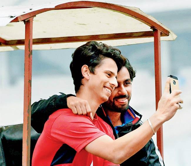 Mumbai players Siddhesh Lad (left) and Iqbal Abdullah take a selfie