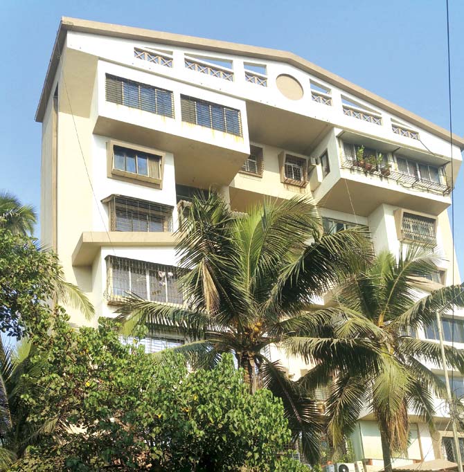 Police suspect the child was thrown from the toilet window of a sixth-floor flat in Atlantis building in Versova