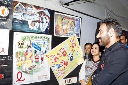 Ajay Devgn spotted at an AIDS awareness campaign in Bandra
