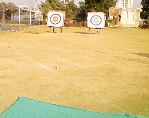 The cricket practice was taking place to the right of the archery targets