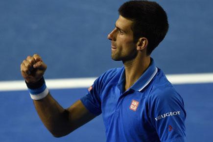Aus Open: Djokovic fights off Wawrinka to set up grand final against Murray