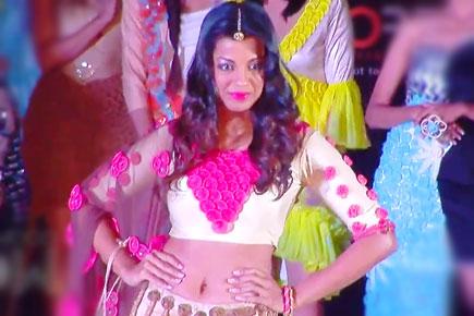 Mugdha Godse wears condom dress on runway