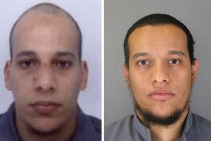 Paris shooting: French Police hunt for 2 in attack that killed 12; 1 surrenders