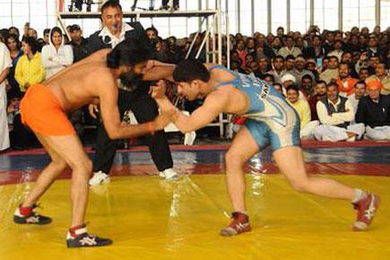 'Wrestler' Baba Ramdev takes on Olympian Sushil Kumar in first bout