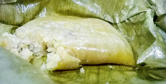 The sweet dish comes wrapped in a banana leaf