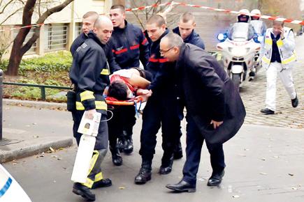 12 killed in Paris magazine office terror attack