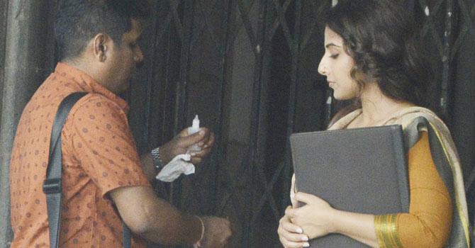 Vidya Balan getting her make-up done