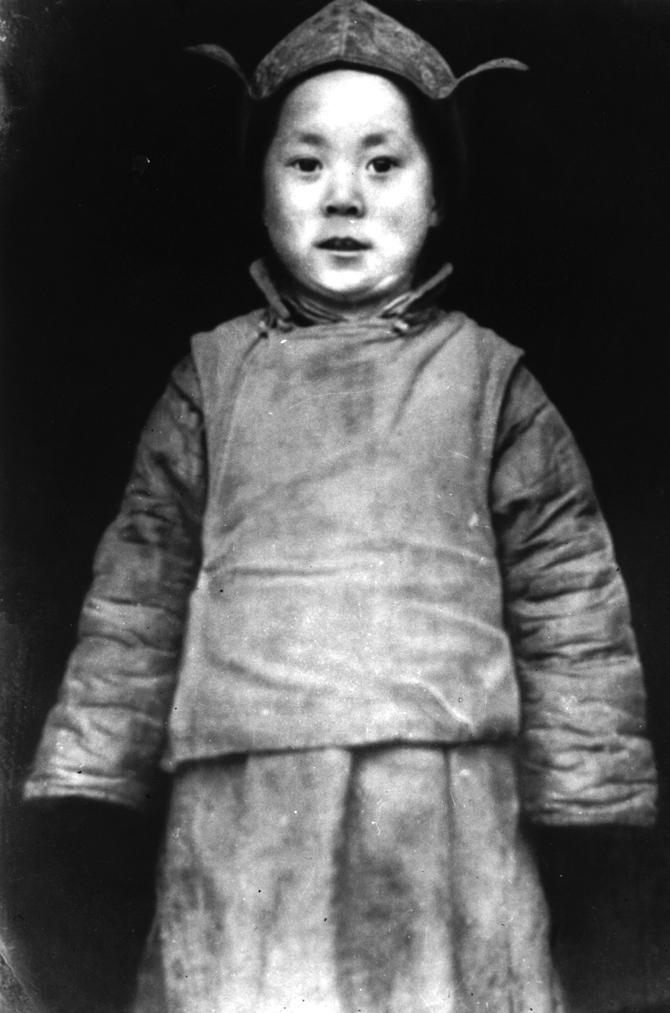 His Holiness posing soon after the search party discovered him in 1939 in Kumbum, Amdo, Tibet. 