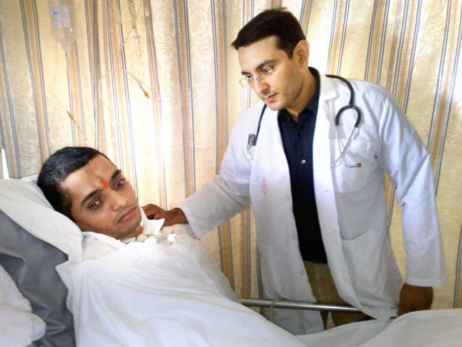 Parag Sawant with his physiotherapist at Hinduja Hospital