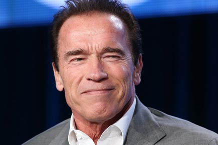 Arnold Schwarzenegger trains son Joseph Baena