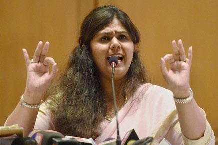 Pankaja Munde stokes controversy after staffer seen carrying her slippers