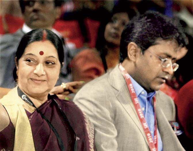 External Affairs Minister Sushma Swaraj with former IPL chief Lalit Modi during an IPL match in New Delhi in 2010. Both are currently embroiled in the Lalitgate controversy. Pic/PTI