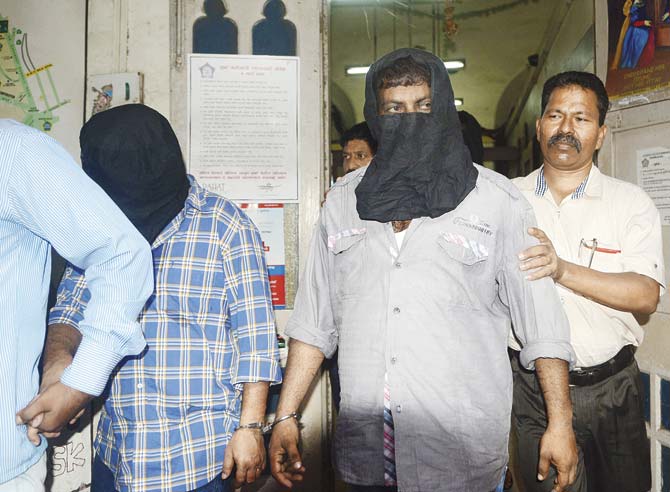 A file pic of some of the accused being taken to court