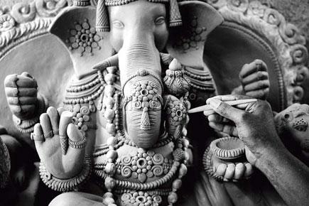 Artisans craft idols of Mumbai's favourite elephant god