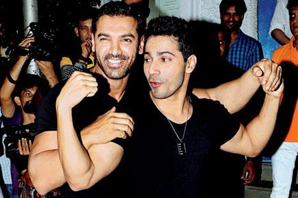 Varun Dhawan and John Abraham compare their biceps