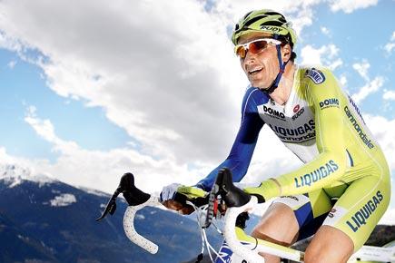 Italian Ivan Basso to quit Tour de France due to testicular cancer