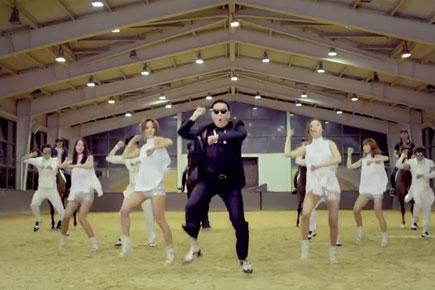 'Gangnam Style' singer Psy's car collides with bus in China
